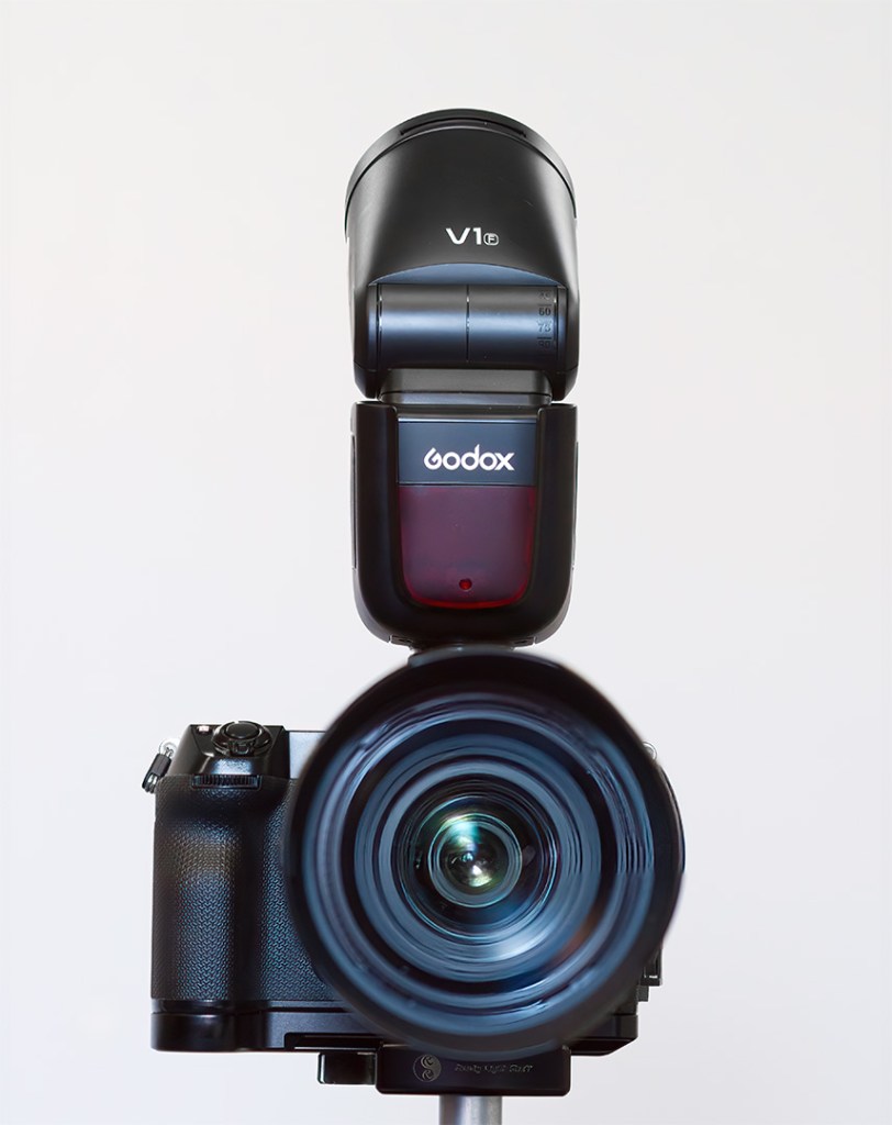 Godox V1 (Fujifilm version) mounted on the hotshoe of a Fujifilm GFX 100s ii shot with bounce flash (one of the techniques that we will be covering during the workshop).  Flash head is pointed behind and above the photographer.